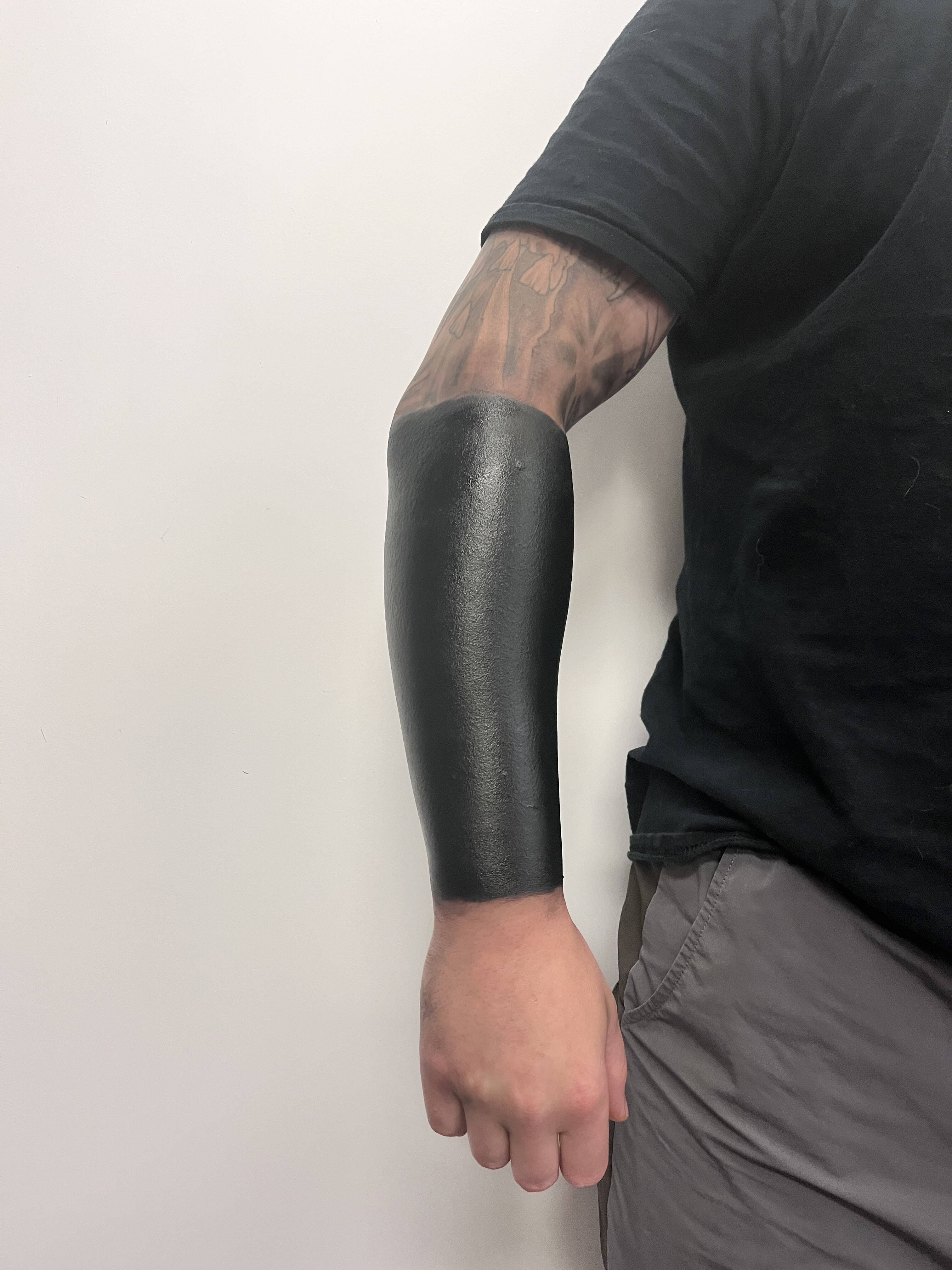 Forearm Blackout Tattoo