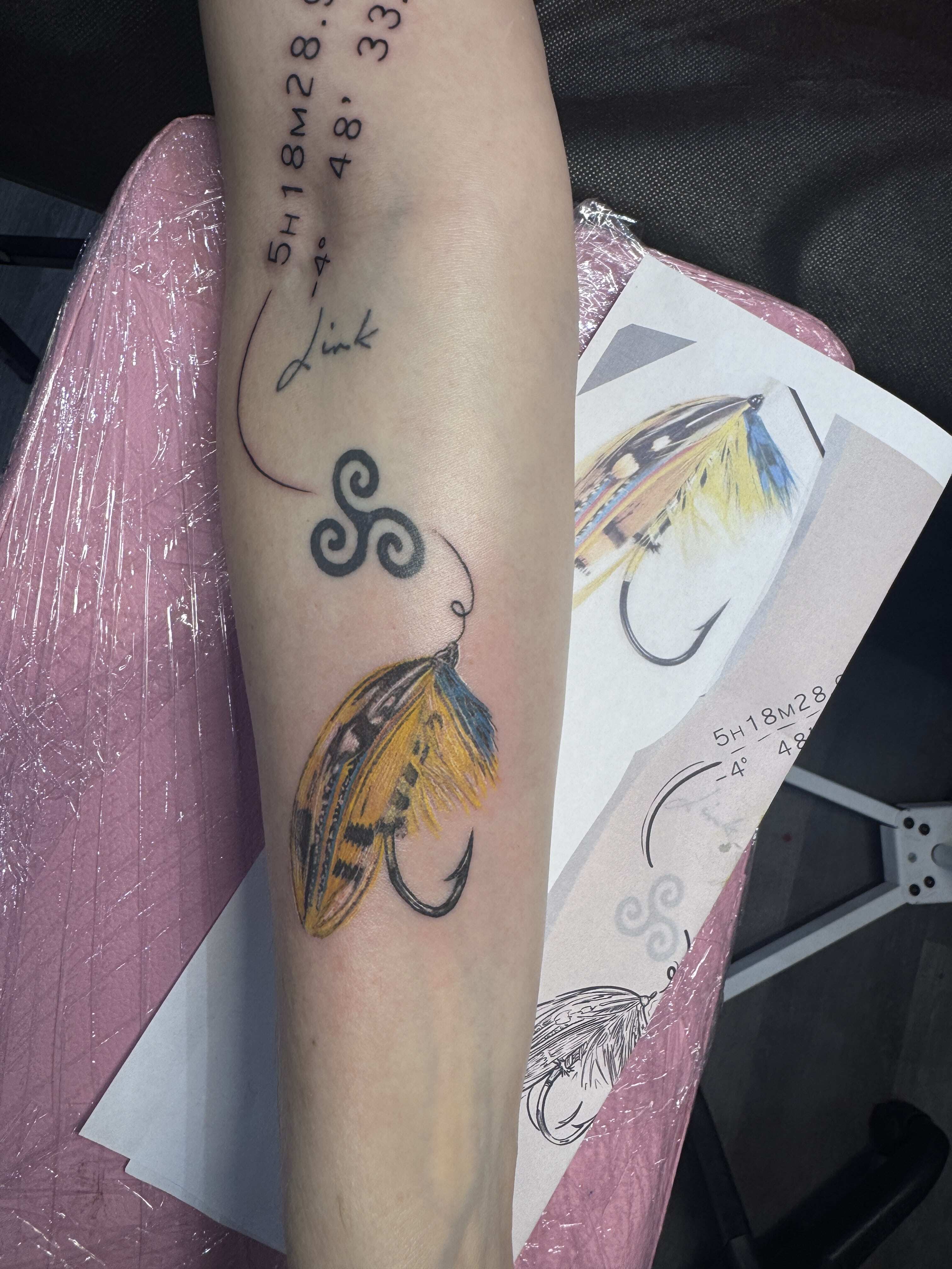 Fly fishing lure Tattoo with script